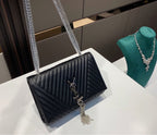 Black woman YSL shoulder handbag