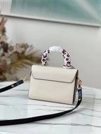 Louis Vuitton Twist PM Bag