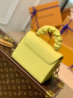 Louis Vuitton Twist PM Bag