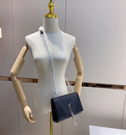 Black woman YSL shoulder handbag