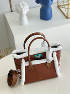 Louis Vuitton On My Side PM Bag