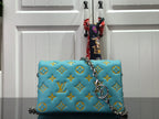 Louis Vuitton Pochette Coussin Bag