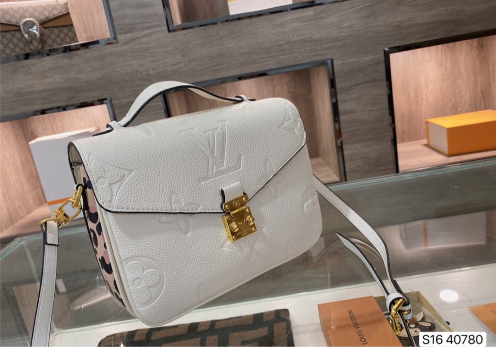 Woman leather LV shoulder handbag