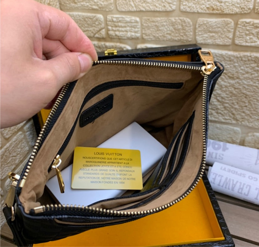 LV woman clutch
