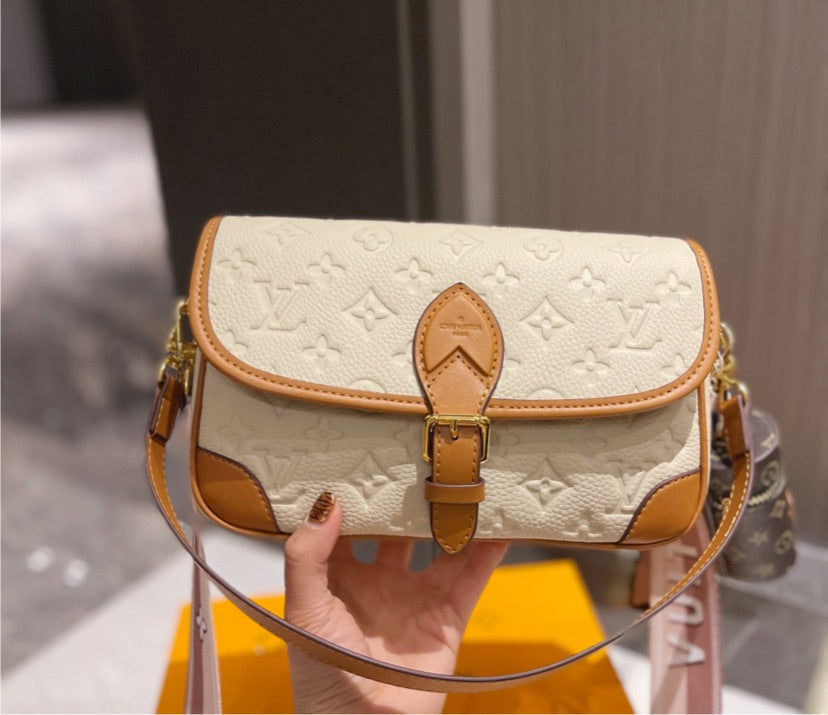 Cream new LV shoulder handbag